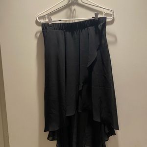 Black Bebe high-low skirt. Size Small.